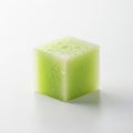 Green translucent cubes with lighter tops placed on a white surface Royalty Free Stock Photo