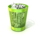 Green trash bin, full of crumpled paper. Isolated