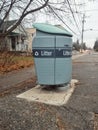 Green trash litter bin with recycle sign in a Toronto street Royalty Free Stock Photo