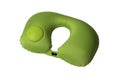 Green travel neck pillow with air valve isolated on white