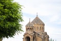 Green tree and church in Armenia