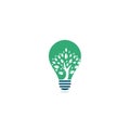 Green tree bulb shape concept logo design. Royalty Free Stock Photo