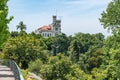 Green tree foliage in Luso Park and Vila Aurora hotel building in the background, Mealhada PORTUGAL Royalty Free Stock Photo