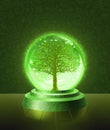 Green tree inside the crystal ball