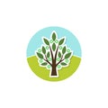 Green tree with leaves logo isolated on white background Royalty Free Stock Photo