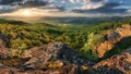 Green trees on mountain under dramatic spring sunset