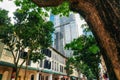 Colonial old buildings against modern glass architecture in Singapore Royalty Free Stock Photo