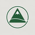 Green triangular mountain icon with a white peak inside a double circular border. A Royalty Free Stock Photo