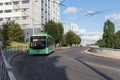 Green trolley bus on the street of Kaliningrad in summer time, Russia