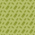 Green tropical leaves in a seamless pattern