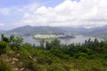 Green Tropical mountains and hiking route on the Dragon's Back trail near Hong Kong