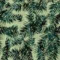 Green tropical palm tree leaves seamless pattern