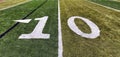 Green Grass Football Field with Yard Number Ten Royalty Free Stock Photo