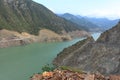 Huge green river surrounded with mountaines