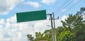 Directional green blank empty road sign in Tulum Mexico Royalty Free Stock Photo