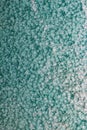 Green or turquoise hammered metal background,abstract metalic te Royalty Free Stock Photo