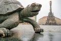 Green turtle bronze statue in the main square in Olomouc next to the Holy Trinity Column. Czech Republic. Royalty Free Stock Photo