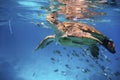 Green turtle swimming in a blue ocean Royalty Free Stock Photo