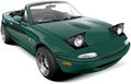 Green two-seater roadster with open headlights