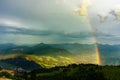 Green tyrol alm alps nature landscape in Austria at summer after storm with rainbow Royalty Free Stock Photo