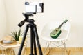 Green ukulele being recorded by a professional camera in the studio Royalty Free Stock Photo