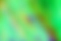 Green unfocused abstract background. Bright color.