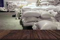 Green unroasted coffee bean sack in food factory