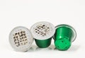 Green used plastic Espresso coffee pods single use cups. Royalty Free Stock Photo