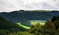 Green valley with farm and cows Royalty Free Stock Photo