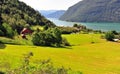 Green valley with fjord at Ornes village Royalty Free Stock Photo