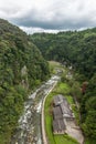 Green valley and japanese house in Kamikawa Otaki Waterfall Park Royalty Free Stock Photo