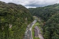 Green valley and japanese house in Kamikawa Otaki Waterfall Park