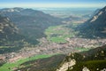 Green valley with small town in Alps mountains Royalty Free Stock Photo