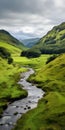 Lush Green Mountains And A Serene River: A Captivating British Landscape