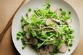 Green vegan radish salad with vitamins greens and peas in plate