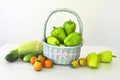 Vegetables in a basket, zucchini, peppers, cucumbers and tomatoes Royalty Free Stock Photo