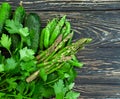 Green vegetables, cucumber, asparagus kitchen  collection , peas on a wooden background rustic Royalty Free Stock Photo