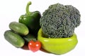 Green vegetables with a red tomato Royalty Free Stock Photo