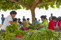 Fresh green salad and vegetables on tropical market on island in Pacific Ocean