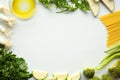 Green vegetables on white background: paprika, parsley, olive oil, onion Royalty Free Stock Photo