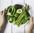 Green vegetables on white plate. Healthy food. Royalty Free Stock Photo