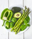 Green vegetables on white plate. Healthy food. Royalty Free Stock Photo