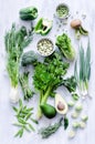 Green vegetables on white rustic background Royalty Free Stock Photo