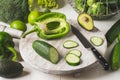 Green vegetables on a wooden cooking board. Royalty Free Stock Photo
