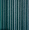 Green vertical textile window blinds. Royalty Free Stock Photo