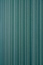 Green vertical textile window blinds. Royalty Free Stock Photo