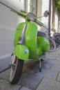 Green Vespa, a beautiful old Italian vintage moped motorcycle