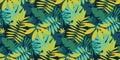 Green vibrant tropical leaves seamless pattern