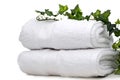 Green vine on white towels