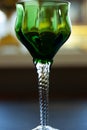 Green vintage wine glass close-up. antique wine glass Royalty Free Stock Photo